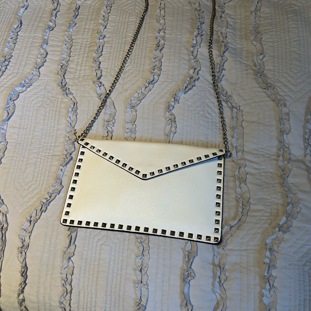 Very cute never been used all white vegan leather envelope style bag